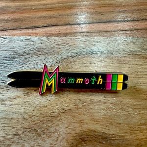 Vintage Mammoth pin with enamel inlay
